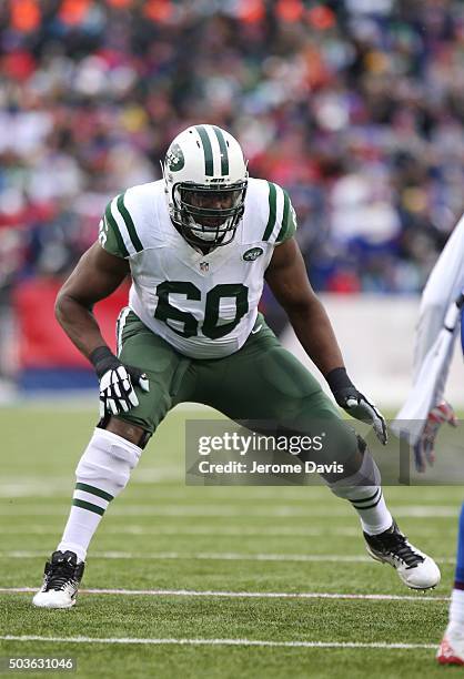 Brickashaw Ferguson of the New York Jets blocks during the first half against the Buffalo Bills at Ralph Wilson Stadium on January 03, 2016 in...