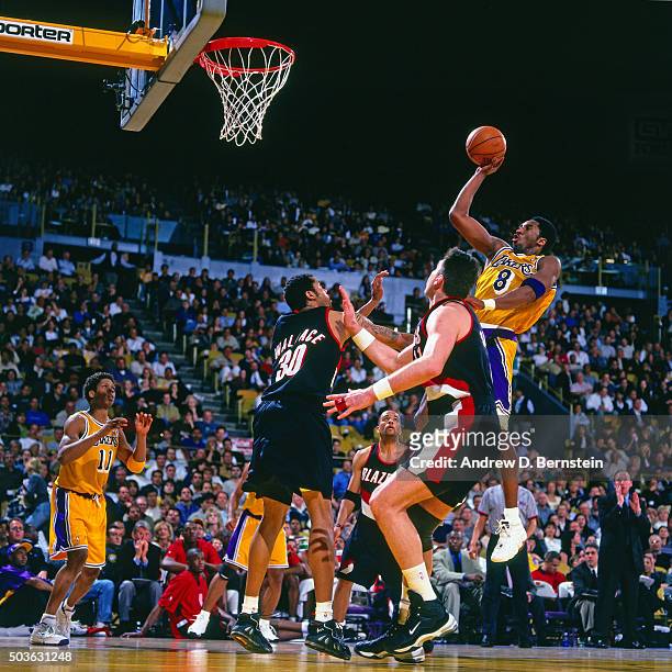 Kobe Bryant of the Los Angeles Lakers shoots against the Portland Trail Blazers on April 29, 1999 at the Great Western Forum in Inglewood,...