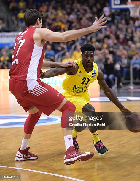 Stanko Barac of Emporio Armani Mailand and Will Cherry of ALBA Berlin in action during the game between Alba Berlin and Emporio Armani Mailand on...