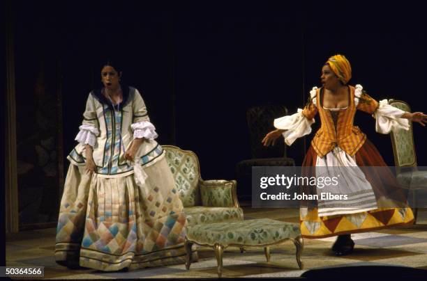 Soprano Maria Ewing as Dorabella & soprano Kathleen Battle as Despina in a scene fr. Mozart's Cosi FanTutti on stage at the Metropolitan Opera.