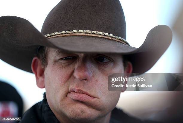 Ryan Bundy, a member of an anti-government militia, speaks to members of the media in front of the Malheur National Wildlife Refuge Headquarters on...