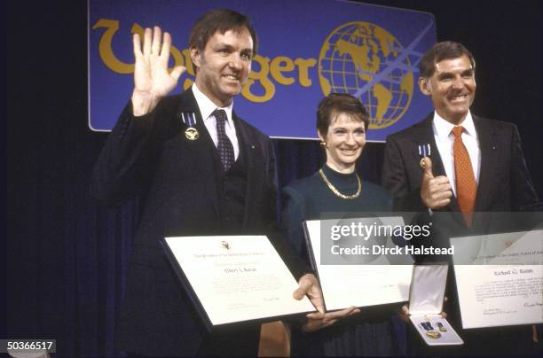 Voyager crew Dick Rutan and Jeana Yeager with designer Bert Rutan, honored with presidential citizens medal, at Century Plaza Hotel