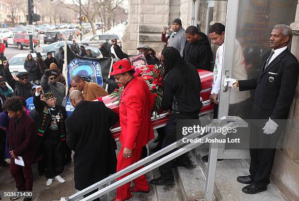 Pallbearers carry the casket of Bettie Jones during her funeral at New Mount Pilgrim Missionary Baptist Church January 6, 2016 in Chicago, Illinois....