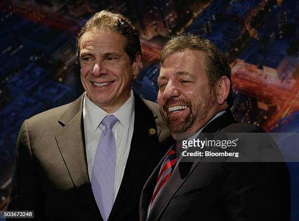 Andrew Cuomo, governor of New York, left, and James "Jim" Dolan, chairman of The Madison Square Garden Co., stand for a photograph after a press...