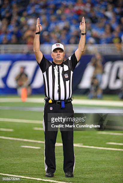 Referee Bill Vinovich signals touchdown during the game between the Detroit Lions and the San Francisco 49ers at Ford Field on December 27, 2015 in...