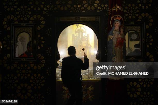 Egyptian Coptic Christians celebrate Christmas in Cairo, Egypt, on January 06, 2016. AFP PHOTO / MOHAMED EL-SHAHED