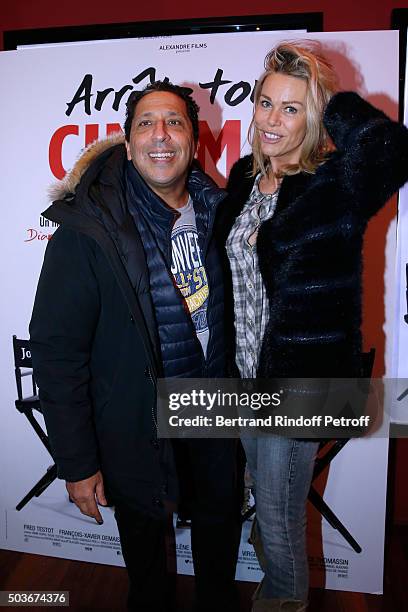 Humorist Smain and his wife Cyd attend the "Arrete Ton Cinema !" Paris Premiere at Publicis Champs Elysees on January 6, 2016 in Paris, France.