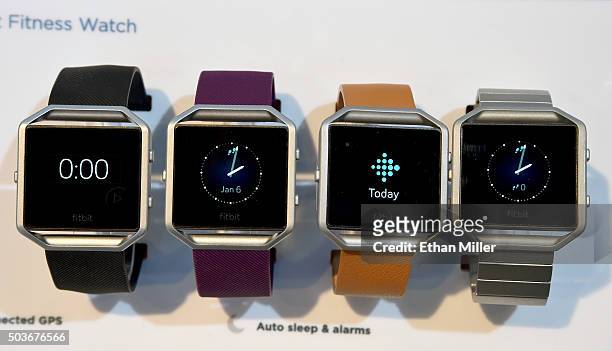 Four Fitbit Blaze color touchscreen smartwatches are displayed at CES 2016 at the Sands Expo and Convention Center on January 6, 2016 in Las Vegas,...
