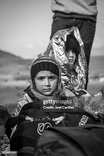 iraqi refugees arriving on lesbos, greece - child trafficking stock pictures, royalty-free photos & images