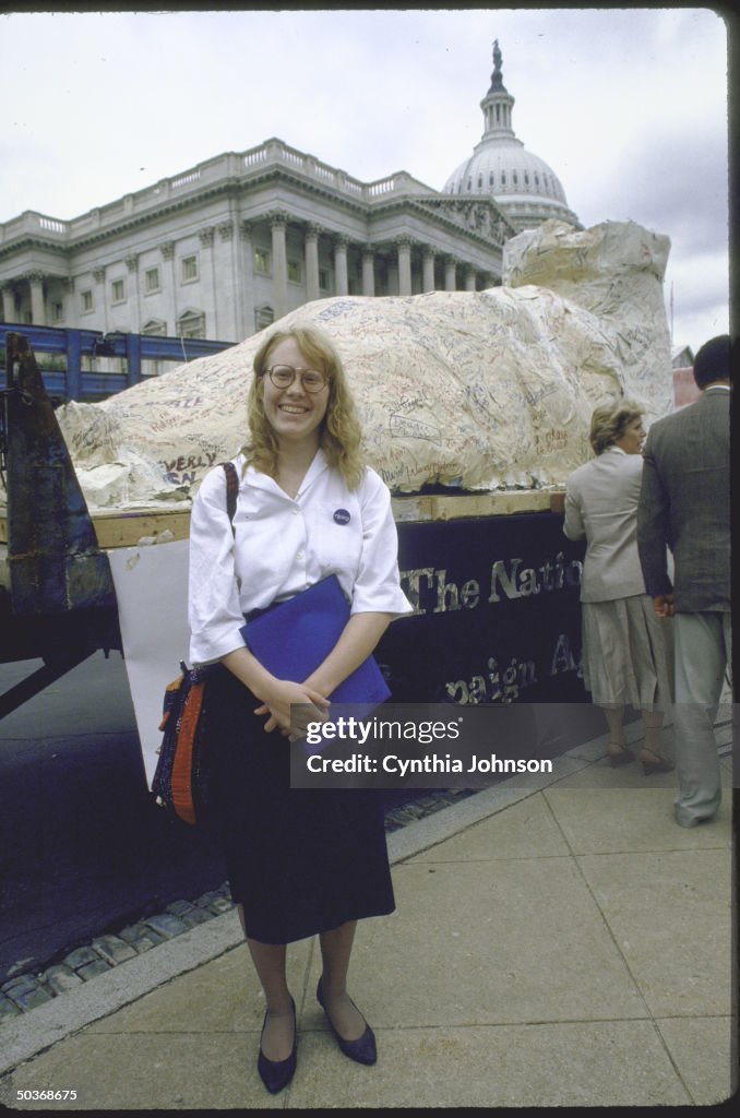Amy Carter, daughter of President Carter, alone in front of Capitol