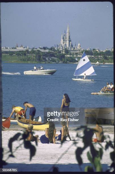 Visitors to Disney World swimming and boating at the Polynesian Village, Florida, 1971.