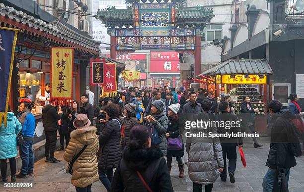 wangfujing snack street in beijing - china street stock pictures, royalty-free photos & images