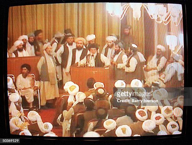 An Al-Jazeera TV freeze frame of Afghanistan's Islamic clergy meeting to debate the status of Osama Bin Laden after the US demanded that the ruling...