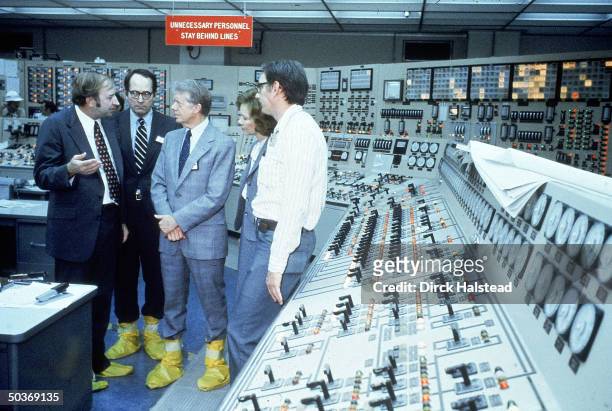 Plant official, President Jimmy Carter, First Lady Rosalynn Carter, Pennsylvania Governor Richard L. Thornburgh and NCR's Harold Denton in a control...