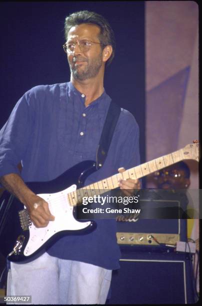 Singer/guitarist Eric Clapton performing on stage.