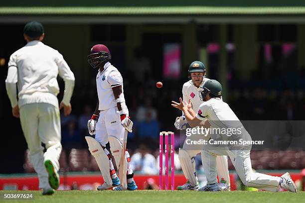 Joe Burns of Australia catches Kemar Roach of West Indies off a delivery by team mate Nathan Lyon of Australia during day five of the third Test...