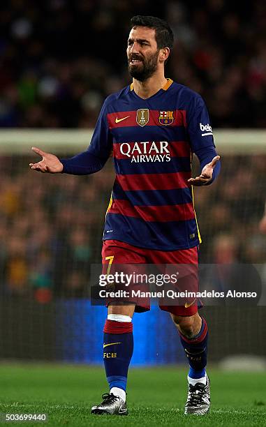 Arda Turan of Barcelona reacts during the Copa del Rey Round of 16 match between FC Barcelona and Real CD Espanyol at Camp Nou on January 6, 2016 in...