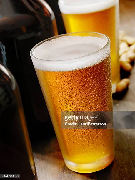 beer growlers - beer nuts stock pictures, royalty-free photos & images