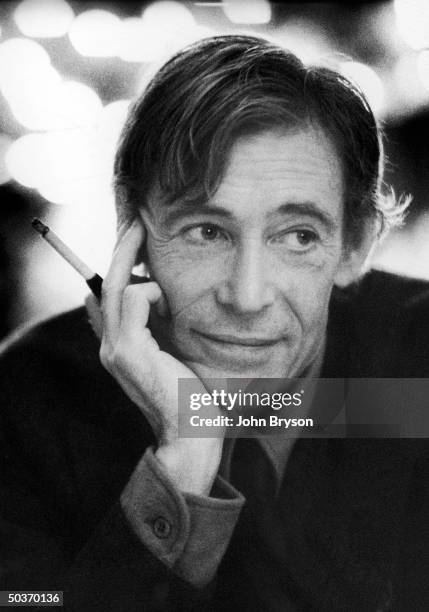 Portrait of actor Peter O'Toole holding cigarette.