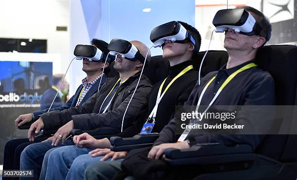 Attendees participate in a Samsung virtual reality experence at CES 2016 at the Las Vegas Convention Center on January 6, 2016 in Las Vegas, Nevada....