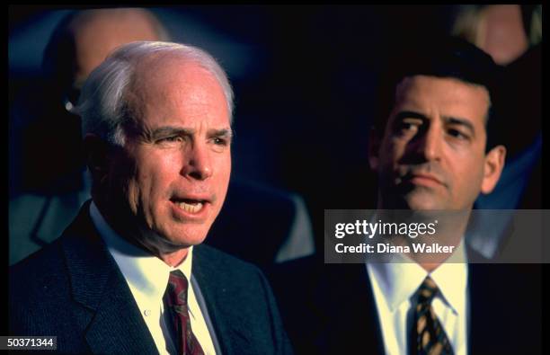 Senators John McCain & Russ Feingold speaking to press outside White House after mtg. W. Pres. Clinton on campaign finance reform.