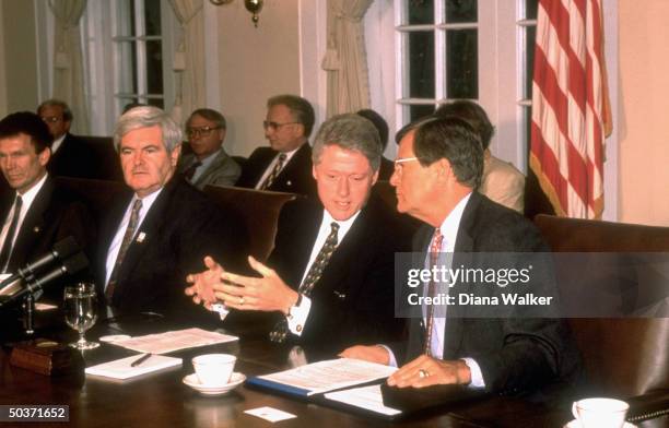 Sen. Tom Daschle , House Speaker Newt Gingrich , Pres. Bill Clinton & Sen. Trent Lott in White House Cabinet Rm. Mtg. On terrorism.