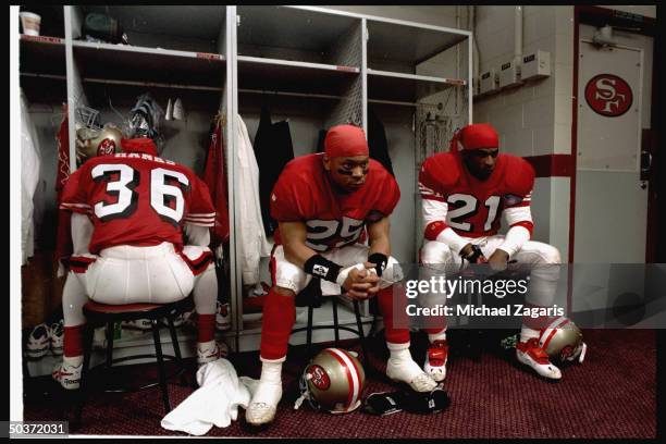 Championship. Portrait of Eric Davis & Deion Sanders in front of lockers pre-game.