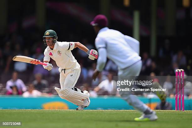 David Warner of Australia runs between the wickets during day five of the third Test match between Australia and the West Indies at Sydney Cricket...
