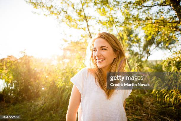 woman - sunny portrait - animal face stock-fotos und bilder