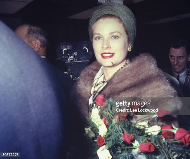 Visiting Princess Grace of Monaco, formerly the actress Grace Kelly, appearing at press conference upon arrival.