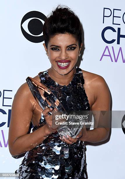 Actress Priyanka Chopra poses with an award in the press room during the People's Choice Awards 2016 at Microsoft Theater on January 6, 2016 in Los...