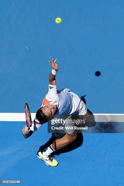 Alexandr Dolgopolov of the Ukraine serves in the men's single match against Lleyton Hewitt of Australia Gold during day five of the 2016 Hopman Cup...