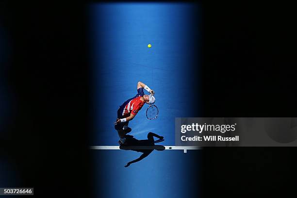 Lleyton Hewitt of Australia Gold serves in the men's single match against Alexandr Dolgopolov of the Ukraine during day five of the 2016 Hopman Cup...