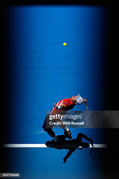 Lleyton Hewitt of Australia Gold serves in the men's single match against Alexandr Dolgopolov of the Ukraine during day five of the 2016 Hopman Cup...