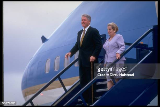 Pres. Bill Clinton & State Secy. Madeleine Albright deplaning from Air Force One.