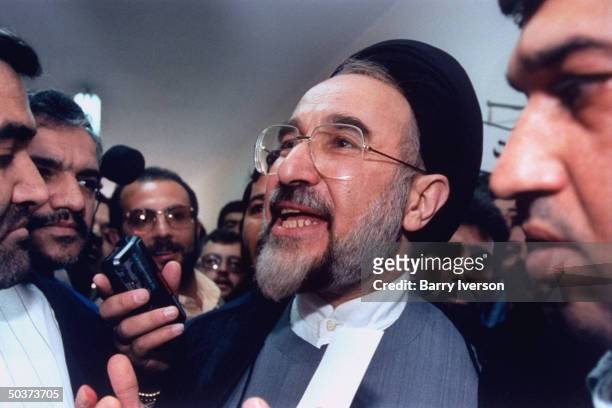 Moderate cleric presidential candidate Mohammed Khatami , surprise front-runner, speaking to reporters before voting at polling station on election...