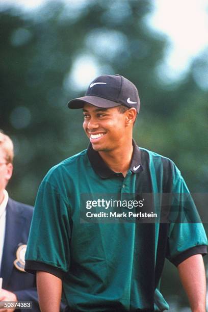 Greater Milwaukee Open. Casual portrait of Tiger Woods alone at Brown Deer Park GC.