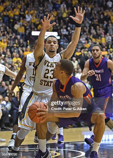 Guard Fred VanVleet of the Wichita State Shockers defends guard Jaylon Brown of the Evansville Aces during the second half on January 6, 2016 at...