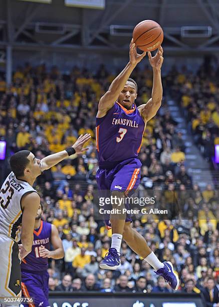 Guard Jaylon Brown of the Evansville Aces passes the ball against guard Fred VanVleet of the Wichita State Shockers during the second half on January...