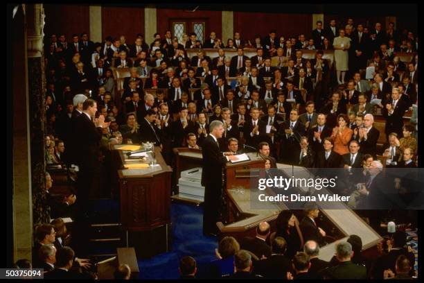 Pres. Bill Clinton delivering his State of Union address to Joint Session of Congress, assembly packed w. People eager to hear him speak amid...