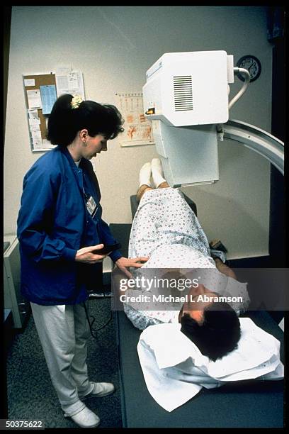 Year-old Christopher Hallowell having bone density scan, undergoing all-day physical examination at Cleveland Clinic Foundation.