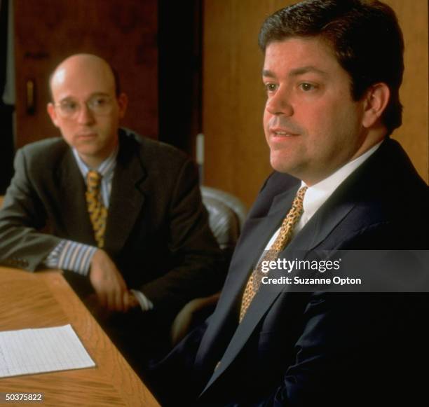 Top financial analysts Jonathan Cohen of Merrill Lynch and Brian Oakes of Lehman Brothers.