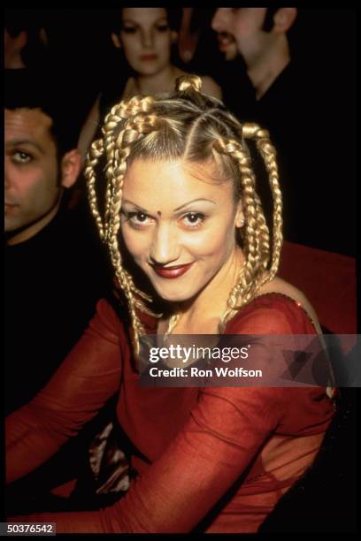 Singer Gwen Stefani sporting pigtails.