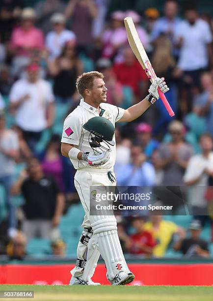 David Warner of Australia celebrates after reaching his century during day five of the third Test match between Australia and the West Indies at...