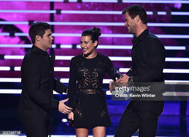 Actor Chris Hemsworth accepts Favorite Action Movie Actor award from actors Adam Devine and Lea Michele onstage during the People's Choice Awards...