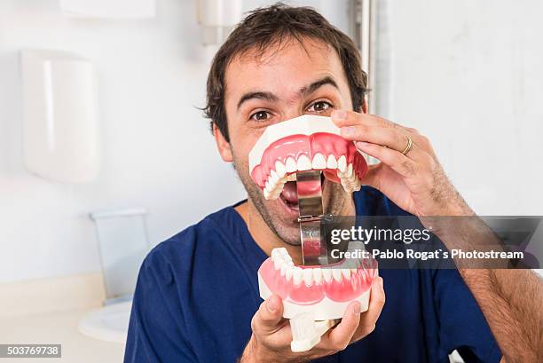 young dentist - dentist's surgery stock pictures, royalty-free photos & images