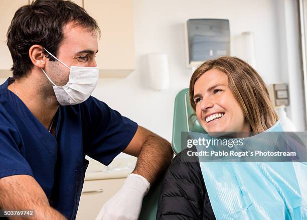 young dentist - dentist's surgery stock pictures, royalty-free photos & images