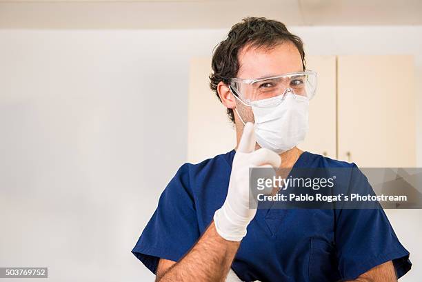 young dentist - dentist's surgery stock pictures, royalty-free photos & images