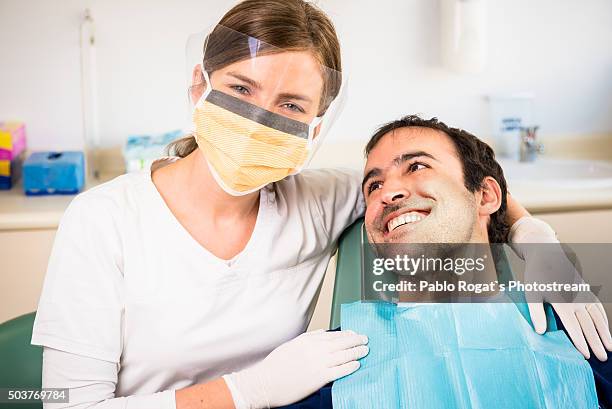 young dentist - dentist's surgery stock pictures, royalty-free photos & images