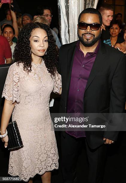 Ice Cube and wife Kimberly Woodruff are seen arriving at the world premiere of the film "Ride Along 2" on January 6, 2016 in Miami Beach, Florida.